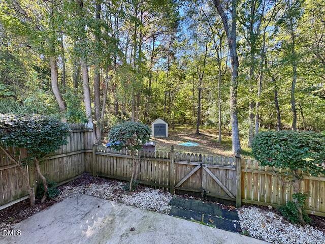 813 St Catherines Drive Wake Forest, NC 27587 - Photo 6 of 16 a view of a wooden fence next to a yard