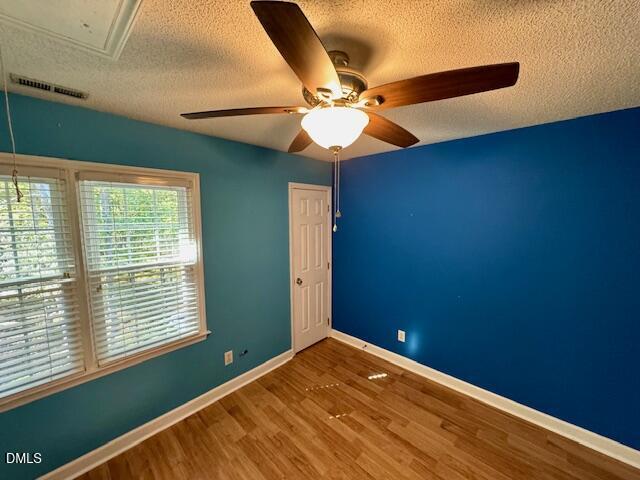 813 St Catherines Drive Wake Forest, NC 27587 - Photo 8 of 16 a view of a room with a ceiling fan and a window