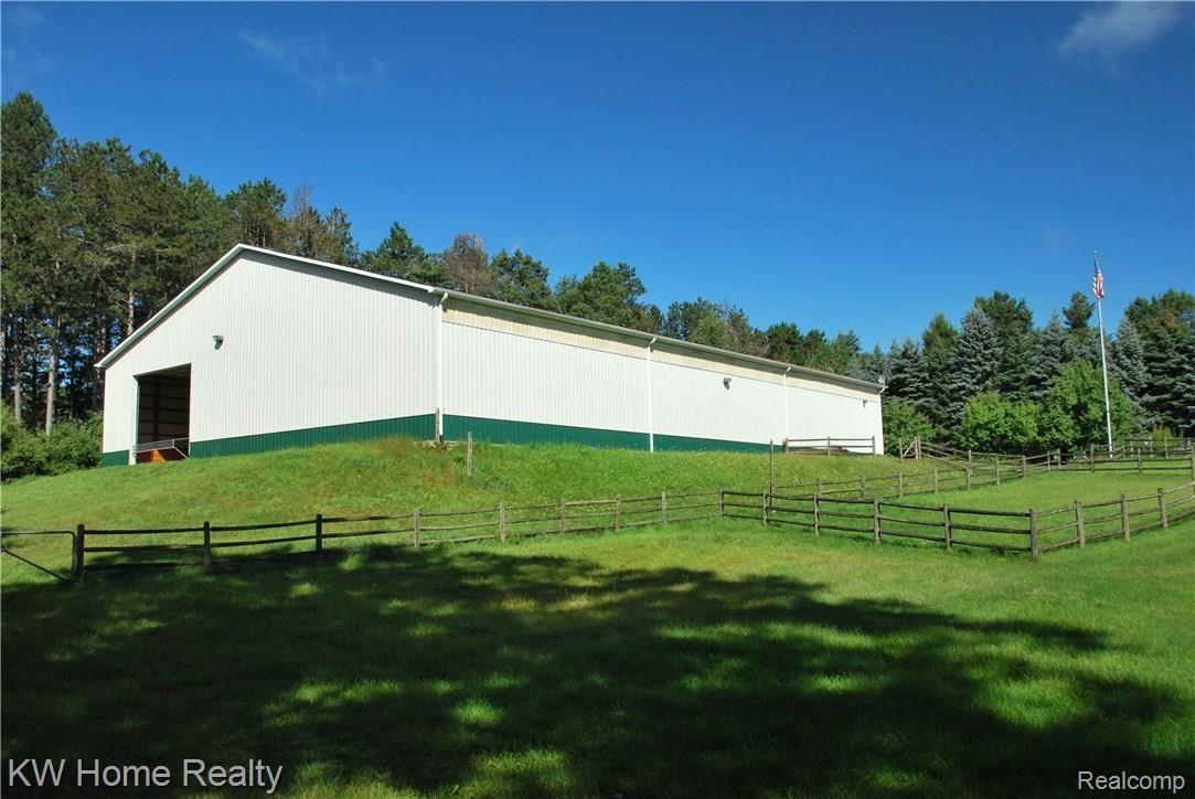 4321 Blood Road Metamora, MI 48455 - Photo 12 of 92 Large doors at each end of the indoor arena. Excellent construction with plenty of light.
