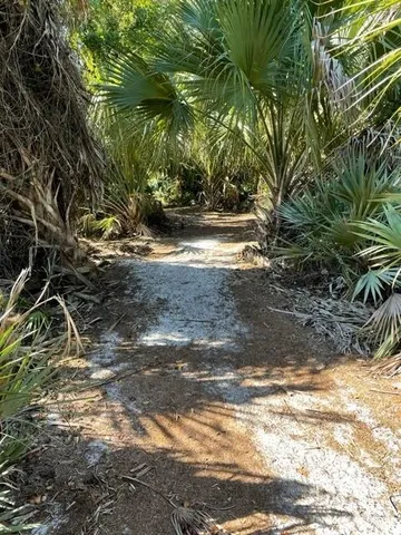 a sign on the side of the road