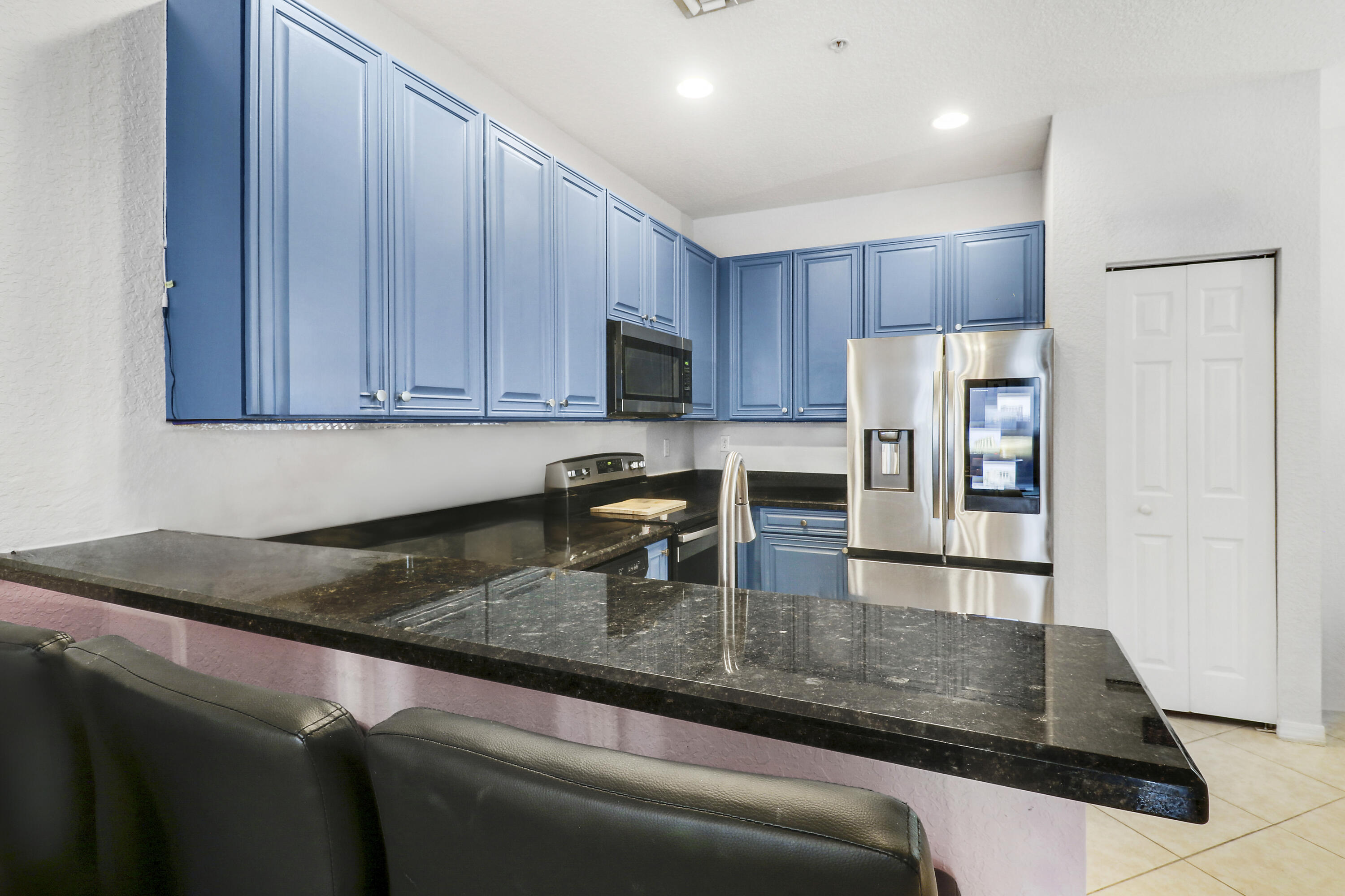 107 Pond Apple Lane, Unit 102 Jupiter, FL 33458 - Photo 9 of 26 Kitchen