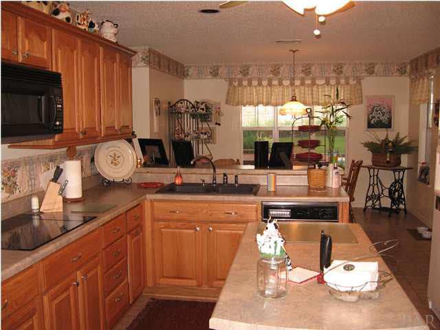400 Turnberry Road Cantonment, FL 32533 - Photo 4 of 12 Kitchen with Center Island.