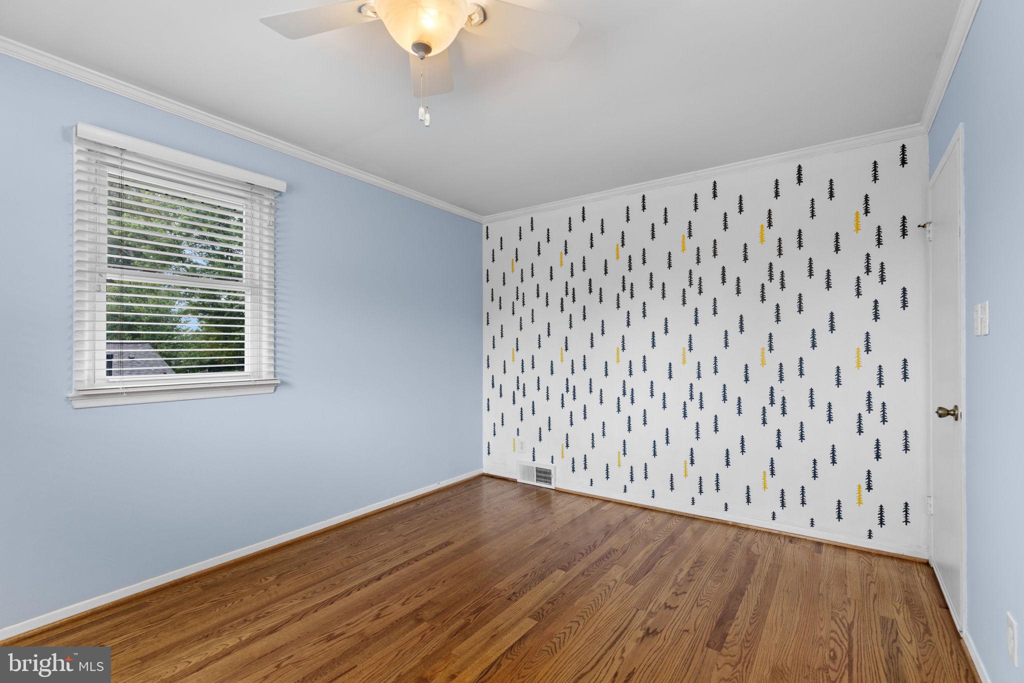 5920 Atteentee Road Springfield, VA 22150 - Photo 19 of 33 a view of wooden floor and a window in a room