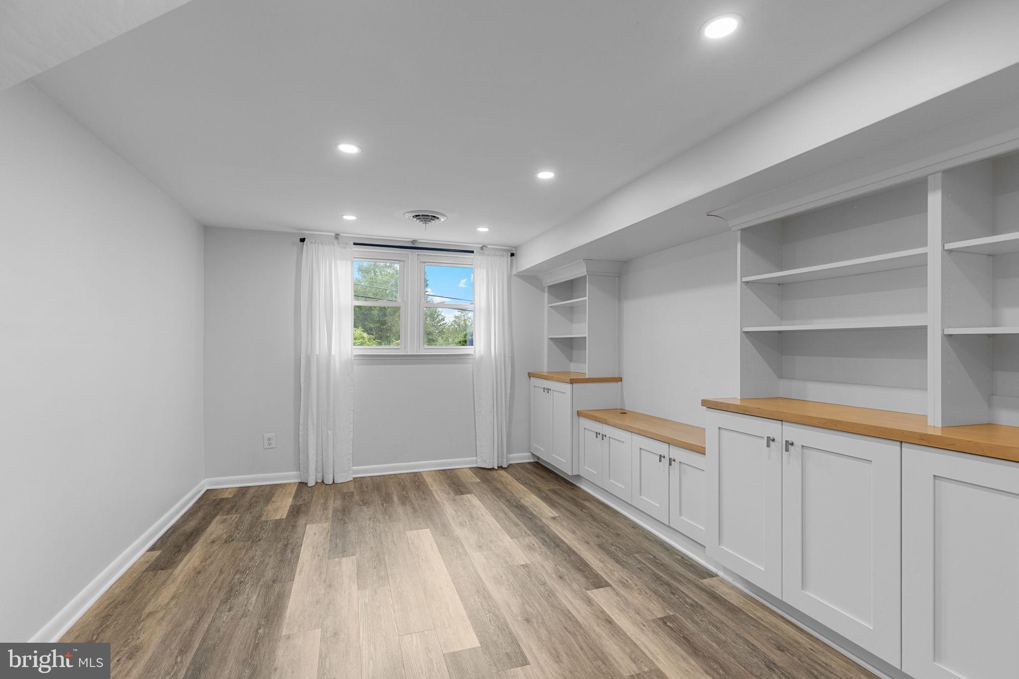 5920 Atteentee Road Springfield, VA 22150 - Photo 25 of 33 a view of a kitchen with wooden floor and electronic appliances
