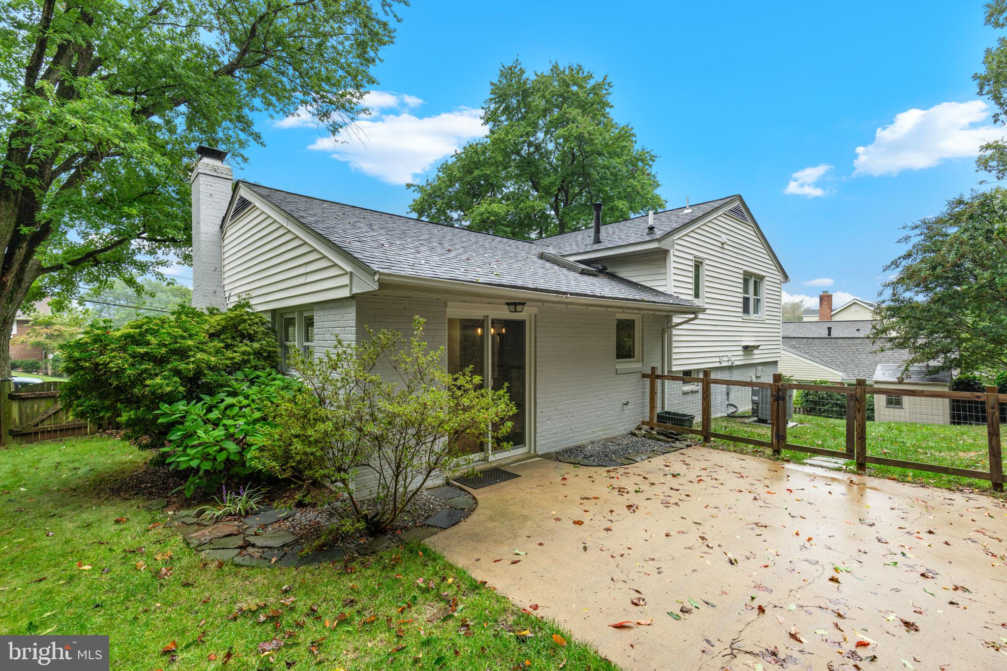 5920 Atteentee Road Springfield, VA 22150 - Photo 27 of 33 a front view of a house with garden