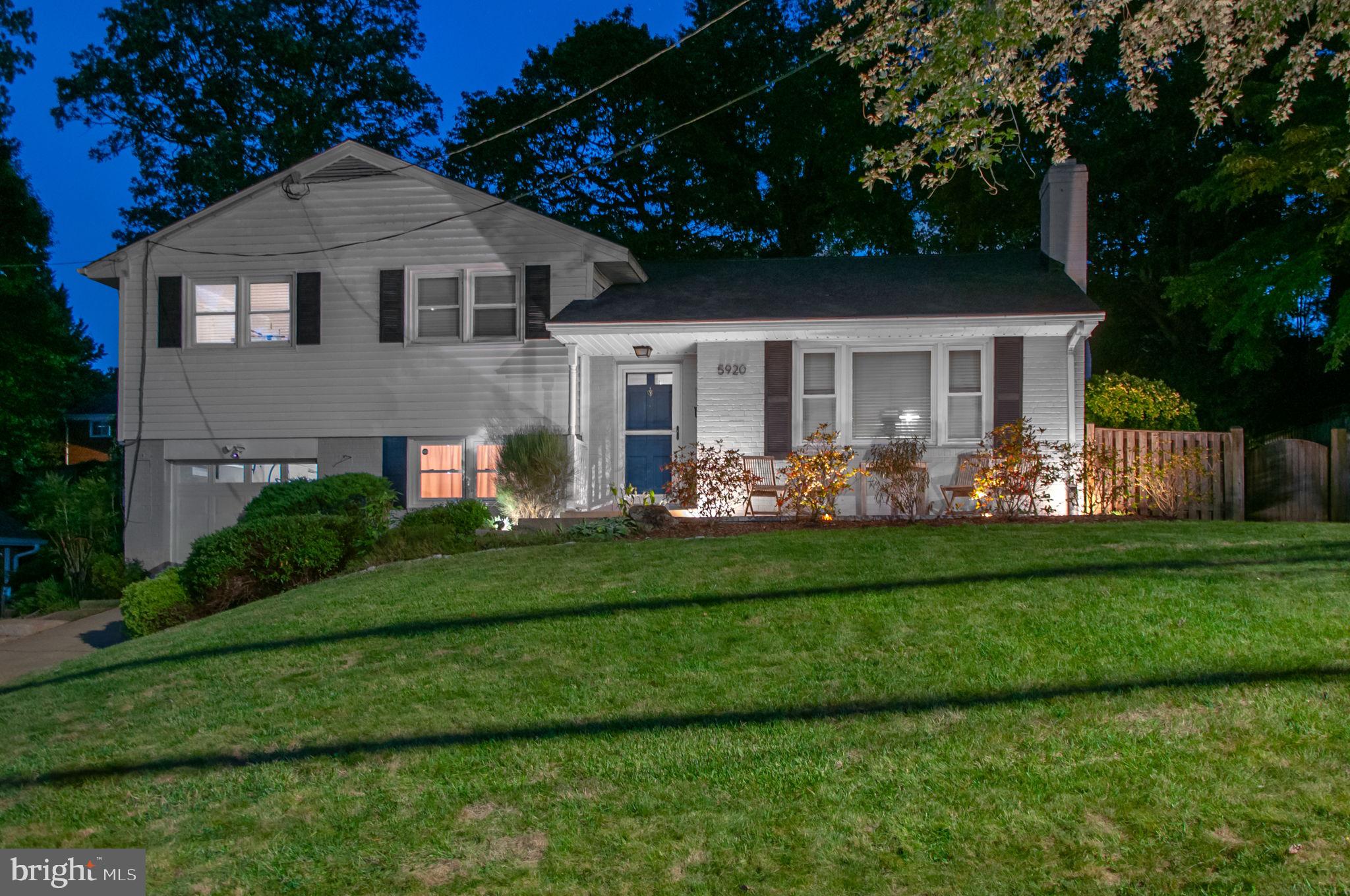 5920 Atteentee Road Springfield, VA 22150 - Photo 30 of 33 a front view of house with yard and green space
