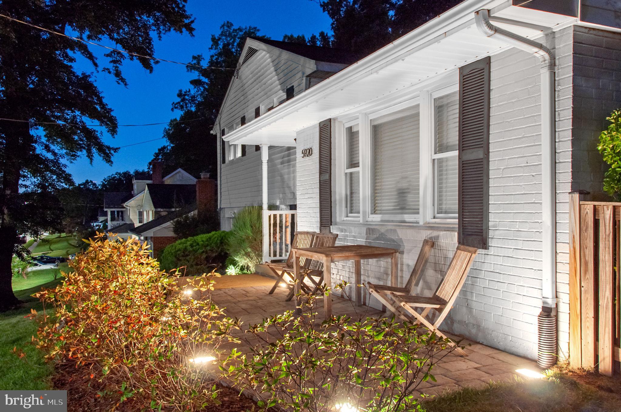 5920 Atteentee Road Springfield, VA 22150 - Photo 31 of 33 a view of a patio with table and chairs and potted plants