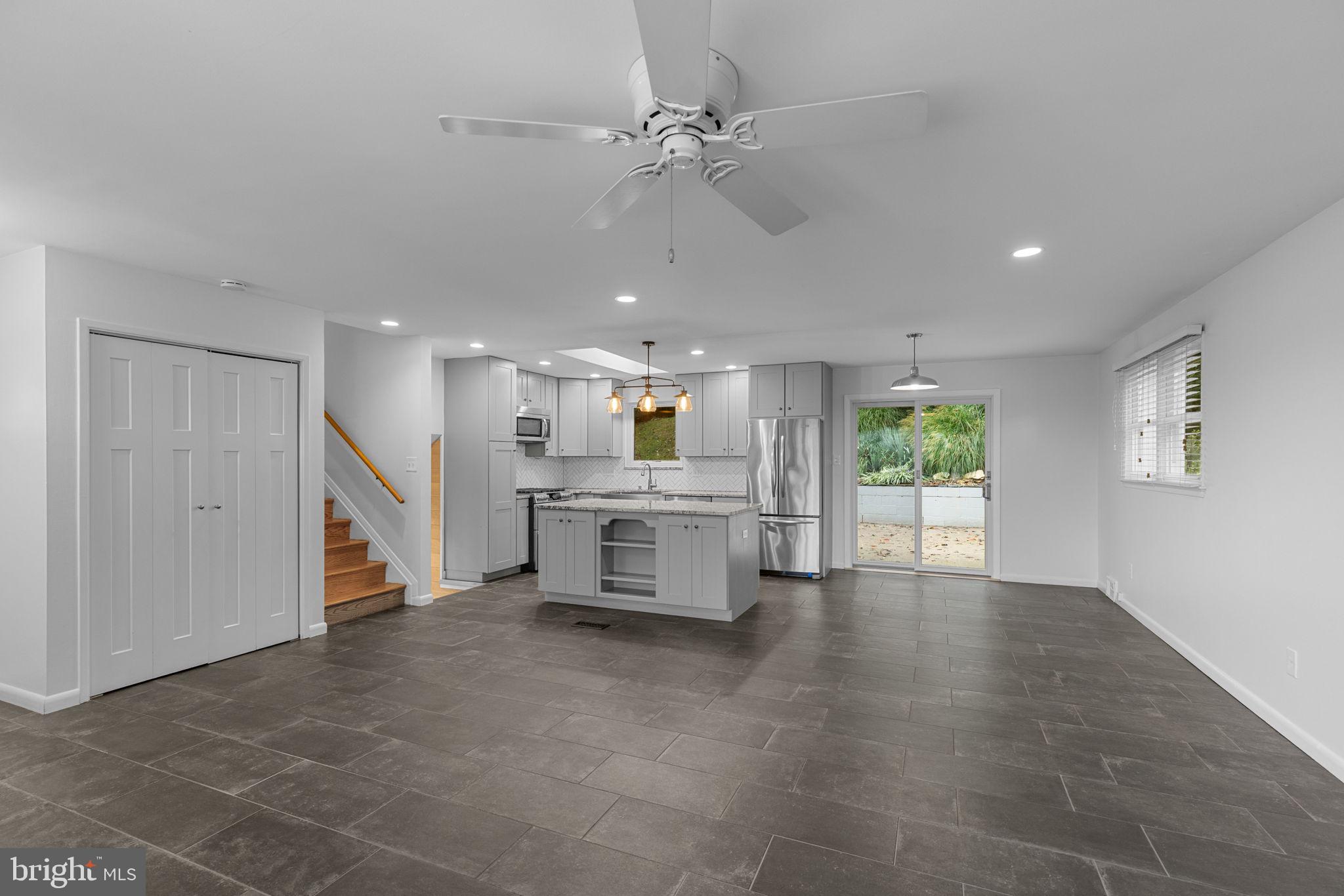 5920 Atteentee Road Springfield, VA 22150 - Photo 8 of 33 a living room with furniture and a ceiling fan