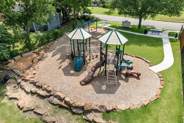 swimming pool view with a backyard space