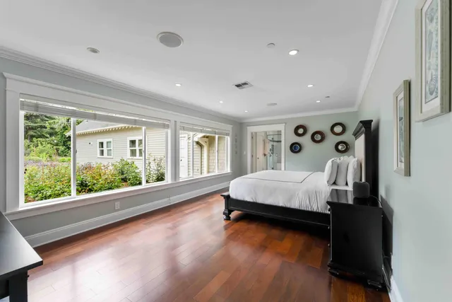 a bathroom with a granite countertop sink mirror and shower
