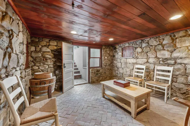 a view of a park with large trees