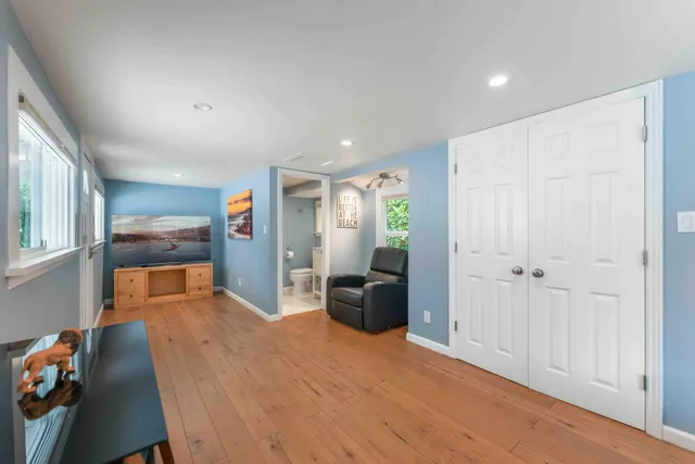 a view of a park with large trees