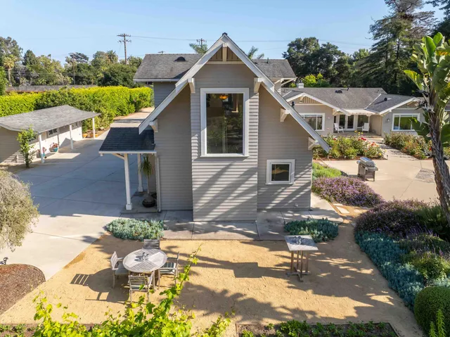 a front view of a house having yard
