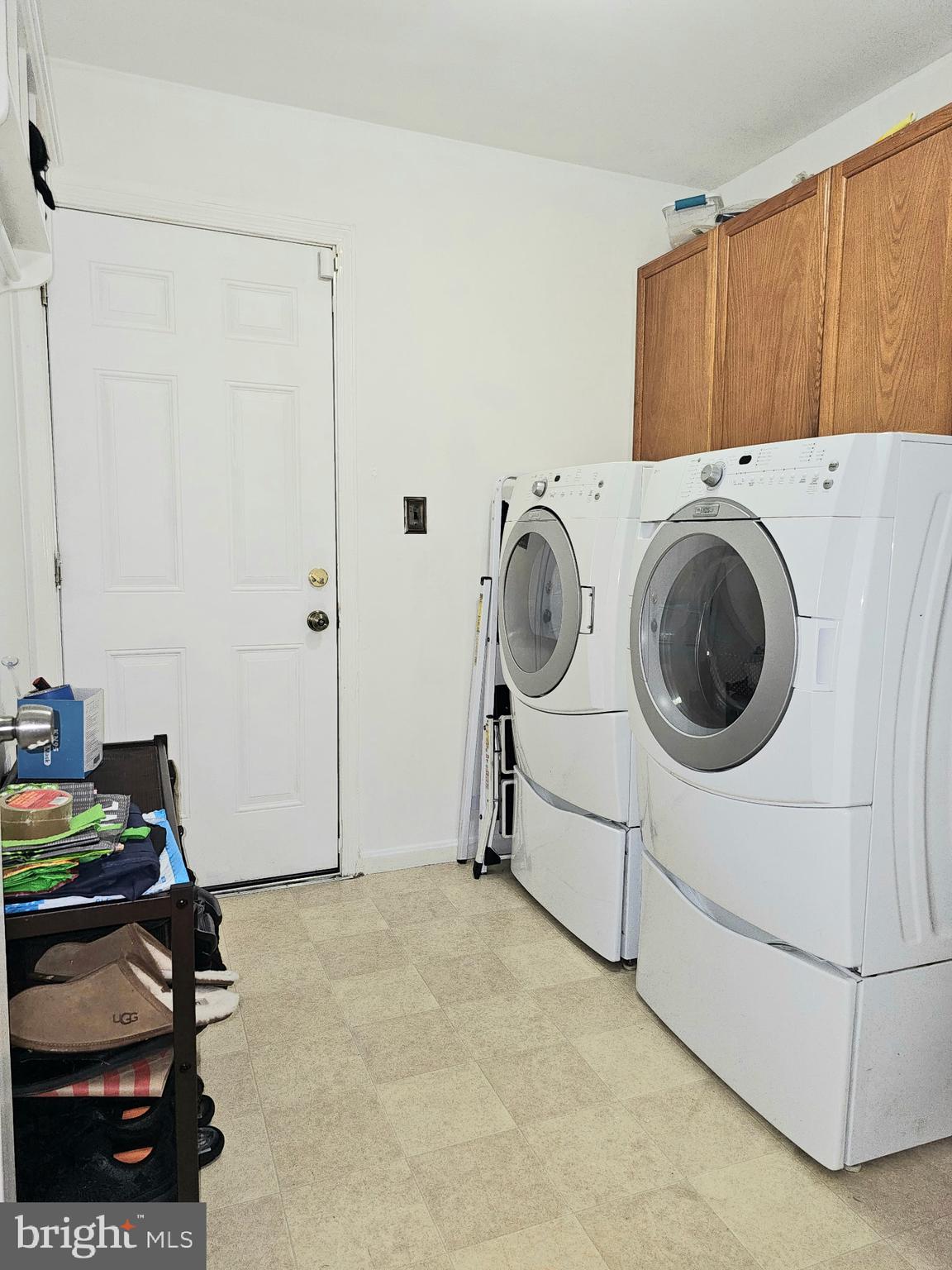 14211 Ansted Road Silver Spring, MD 20905 - Photo 11 of 27 a utility room with dryer and washer