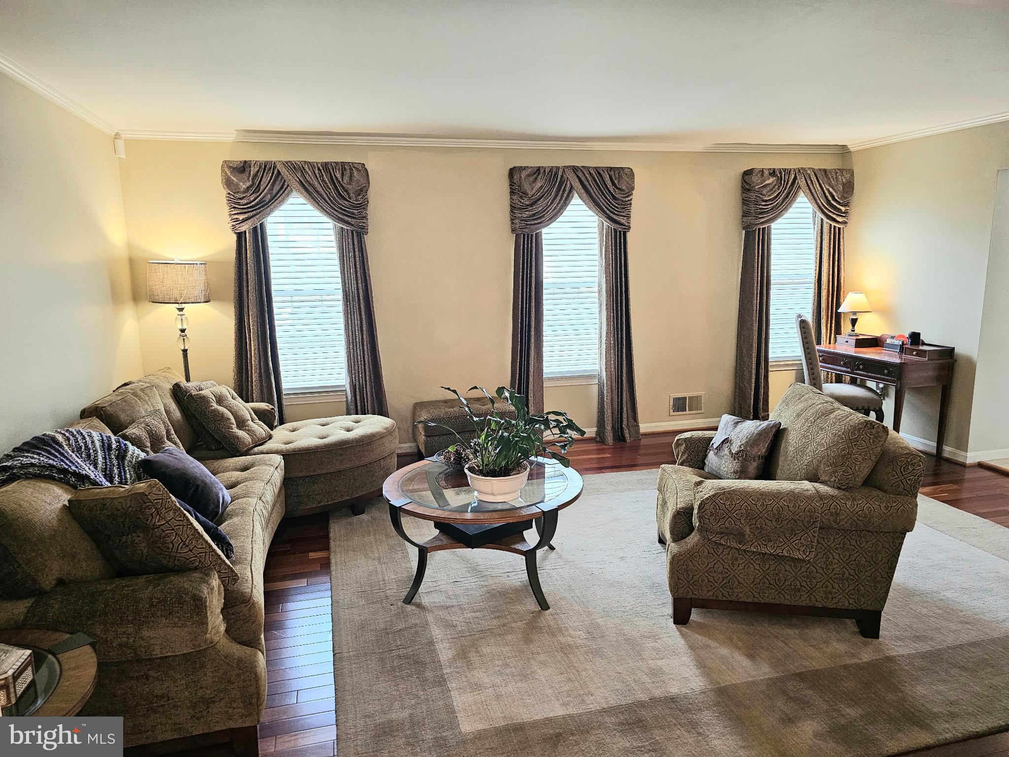 14211 Ansted Road Silver Spring, MD 20905 - Photo 5 of 27 a living room with furniture and a large mirror