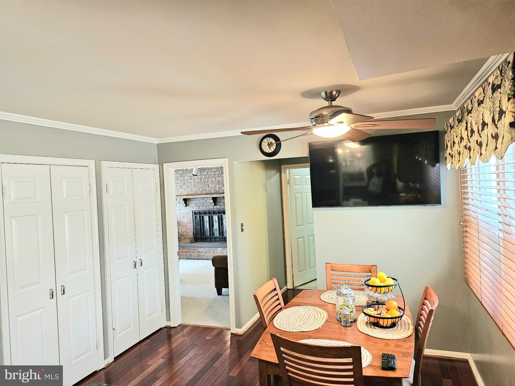 14211 Ansted Road Silver Spring, MD 20905 - Photo 8 of 27 a view of a dining room with furniture and wooden floor