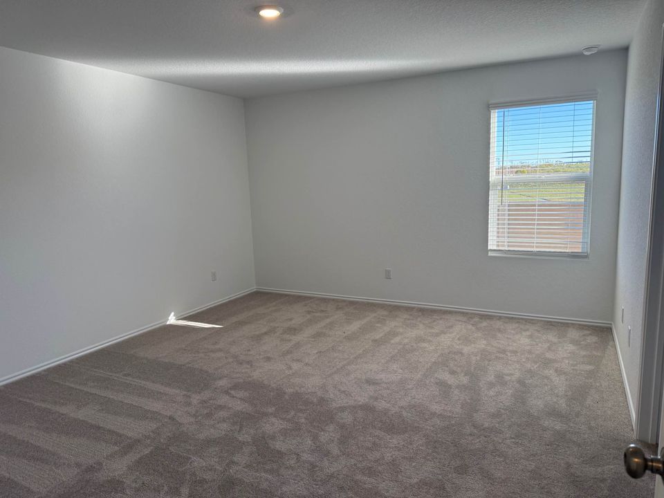 113 Marty Allen Loop Jarrell, TX 76537 - Photo 3 of 16 Primary Bedroom