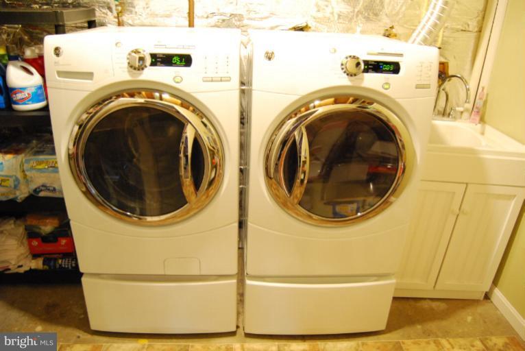 9822 Sherwood Farm Road Owings Mills, MD 21117 - Photo 14 of 29 Energy saver Washer/Dryer in Basement Laundry