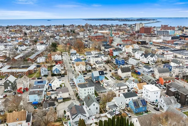 an aerial view of a city with lots of residential buildings