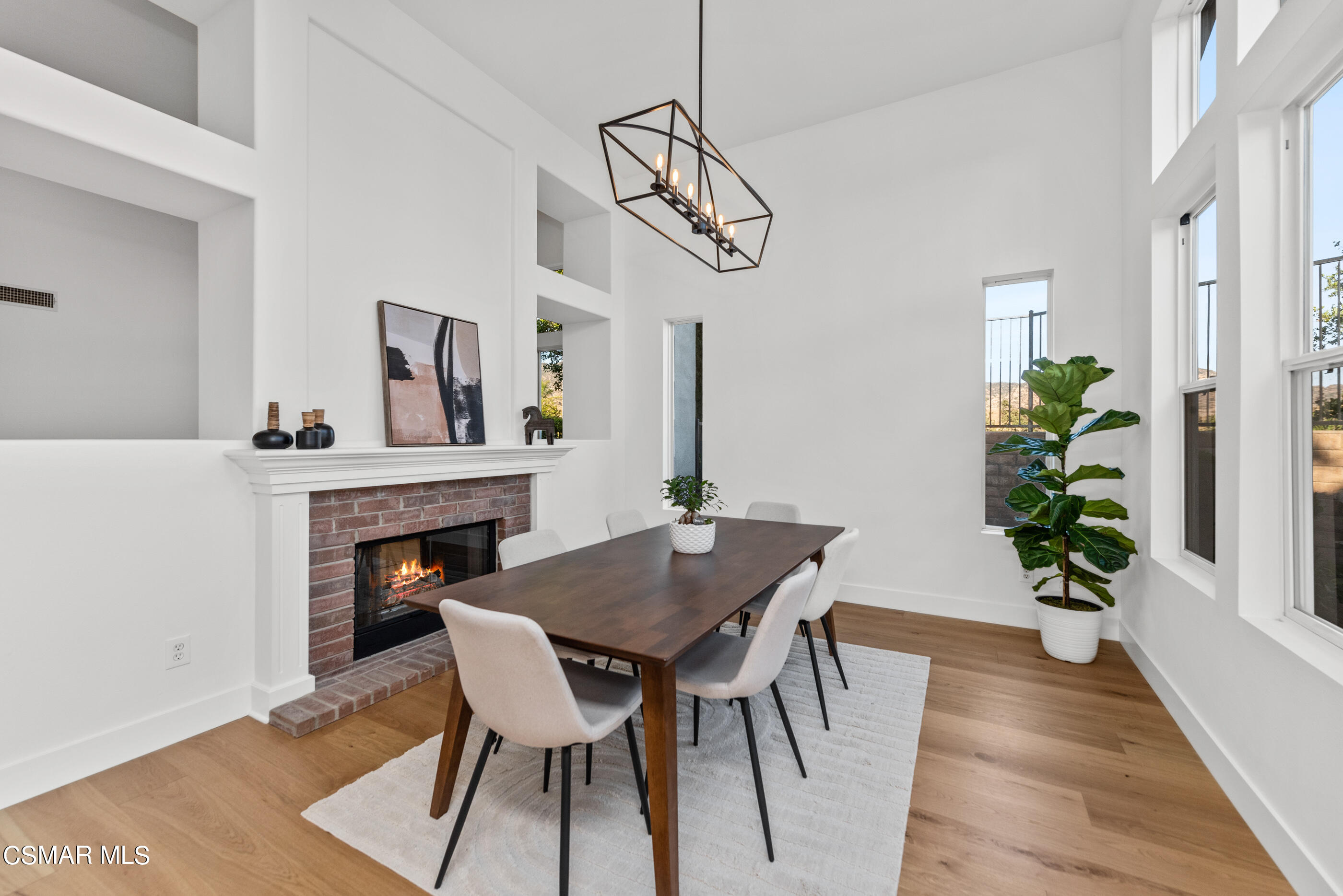 5984 Piuma Court Simi Valley, CA 93063 - Photo 11 of 70 a view of a dining room with furniture and wooden floor