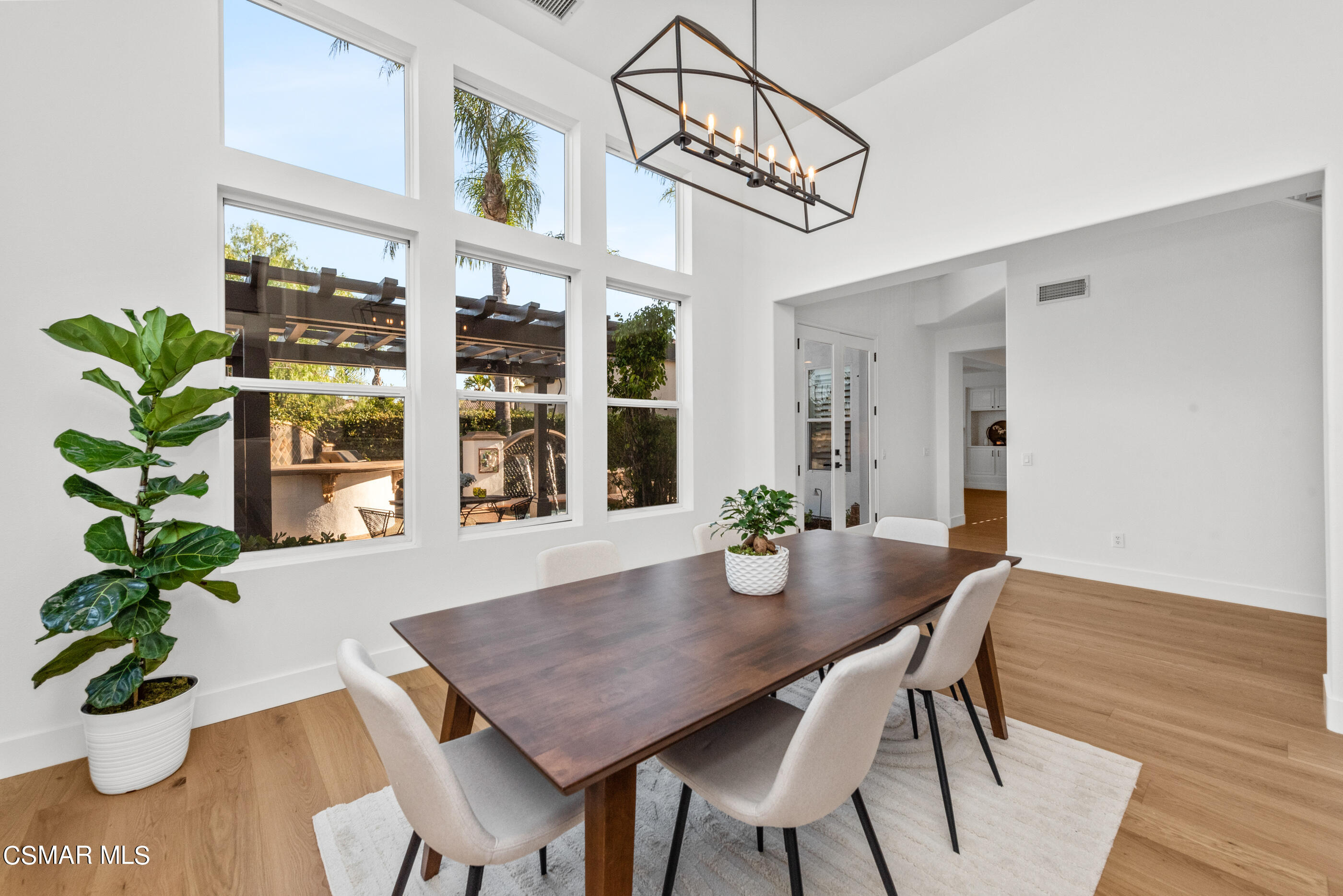 5984 Piuma Court Simi Valley, CA 93063 - Photo 12 of 70 a view of a dining room with furniture wooden floor and chandelier