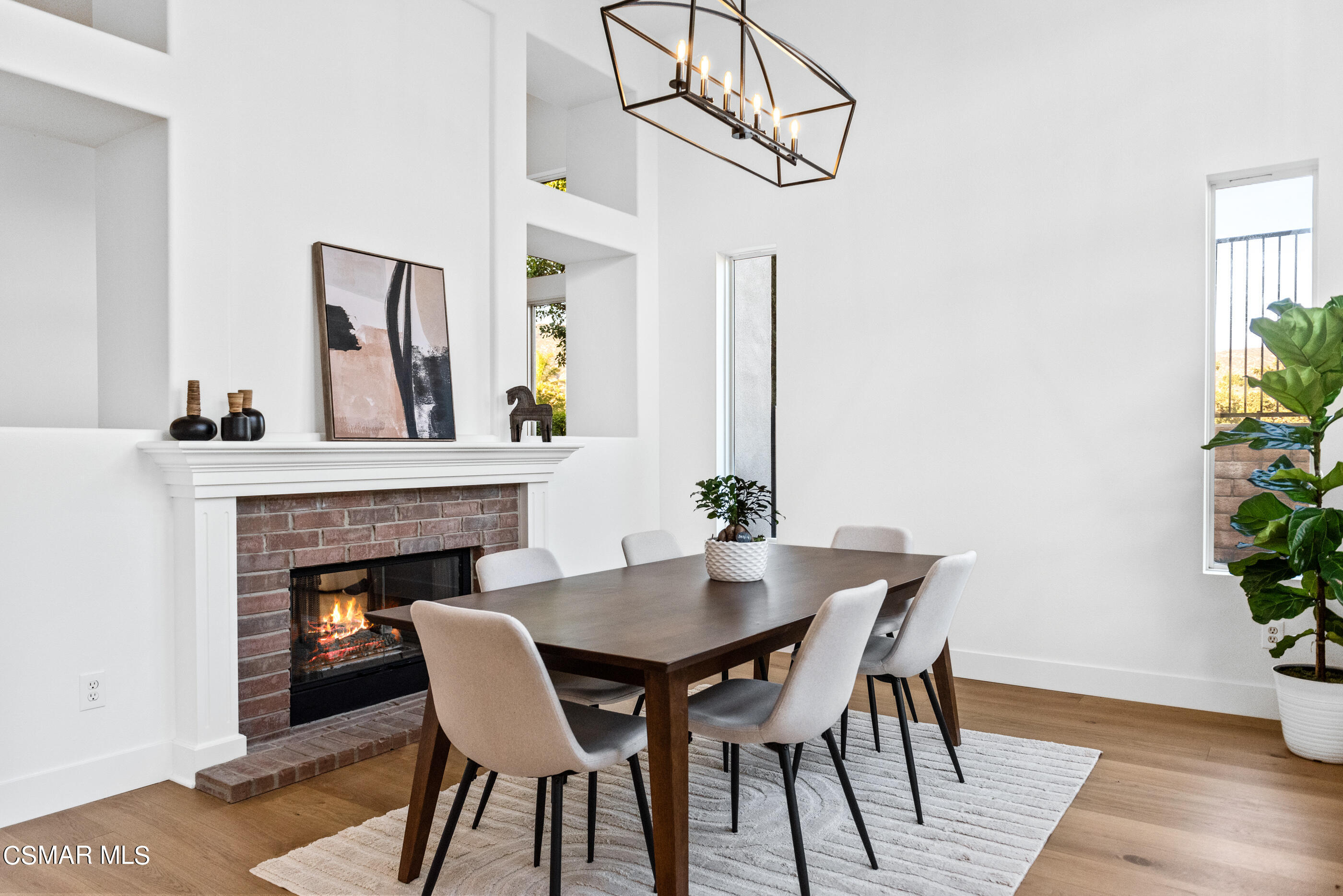 5984 Piuma Court Simi Valley, CA 93063 - Photo 13 of 70 a view of a dining room with furniture and wooden floor