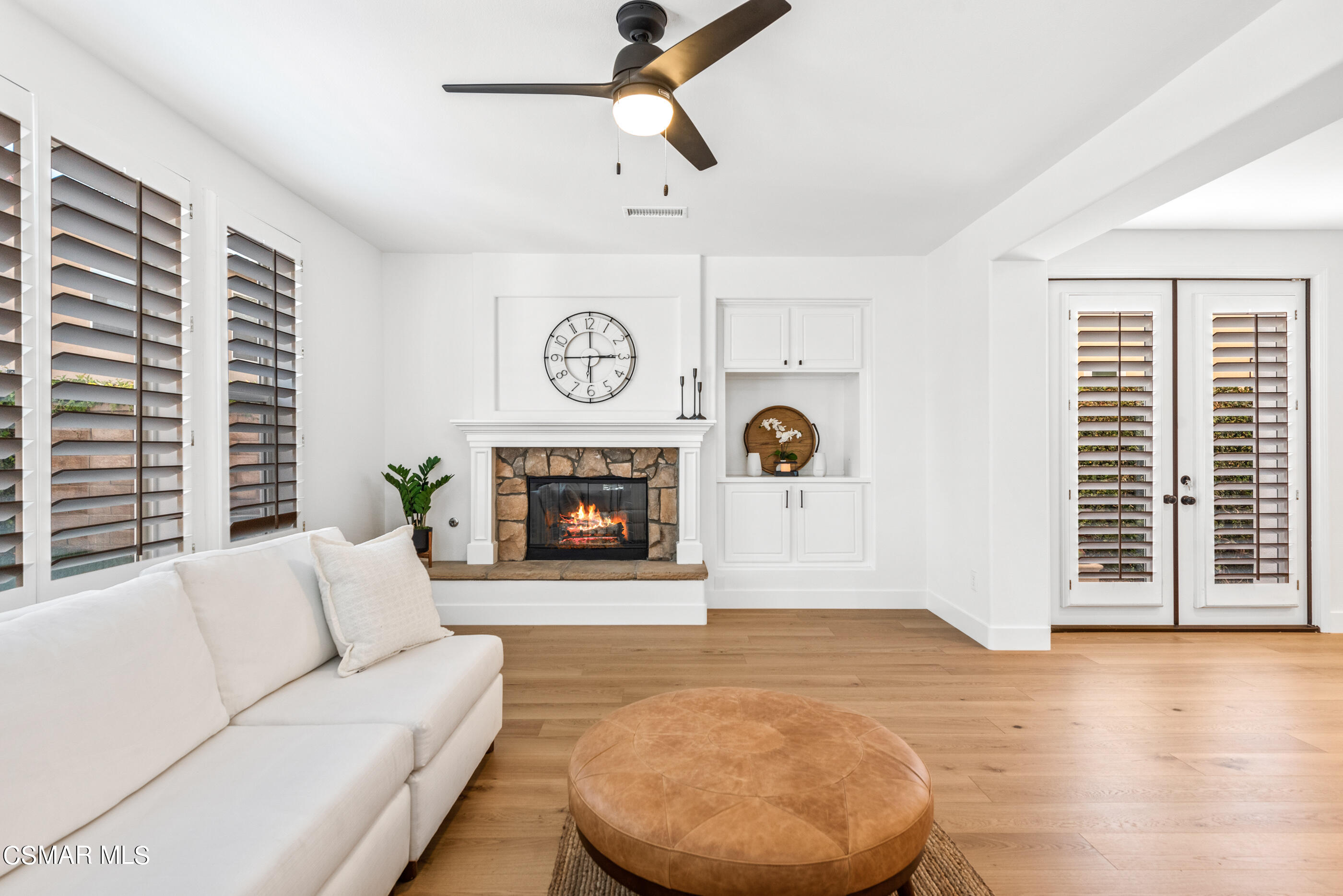 5984 Piuma Court Simi Valley, CA 93063 - Photo 16 of 70 a living room with furniture and a fireplace