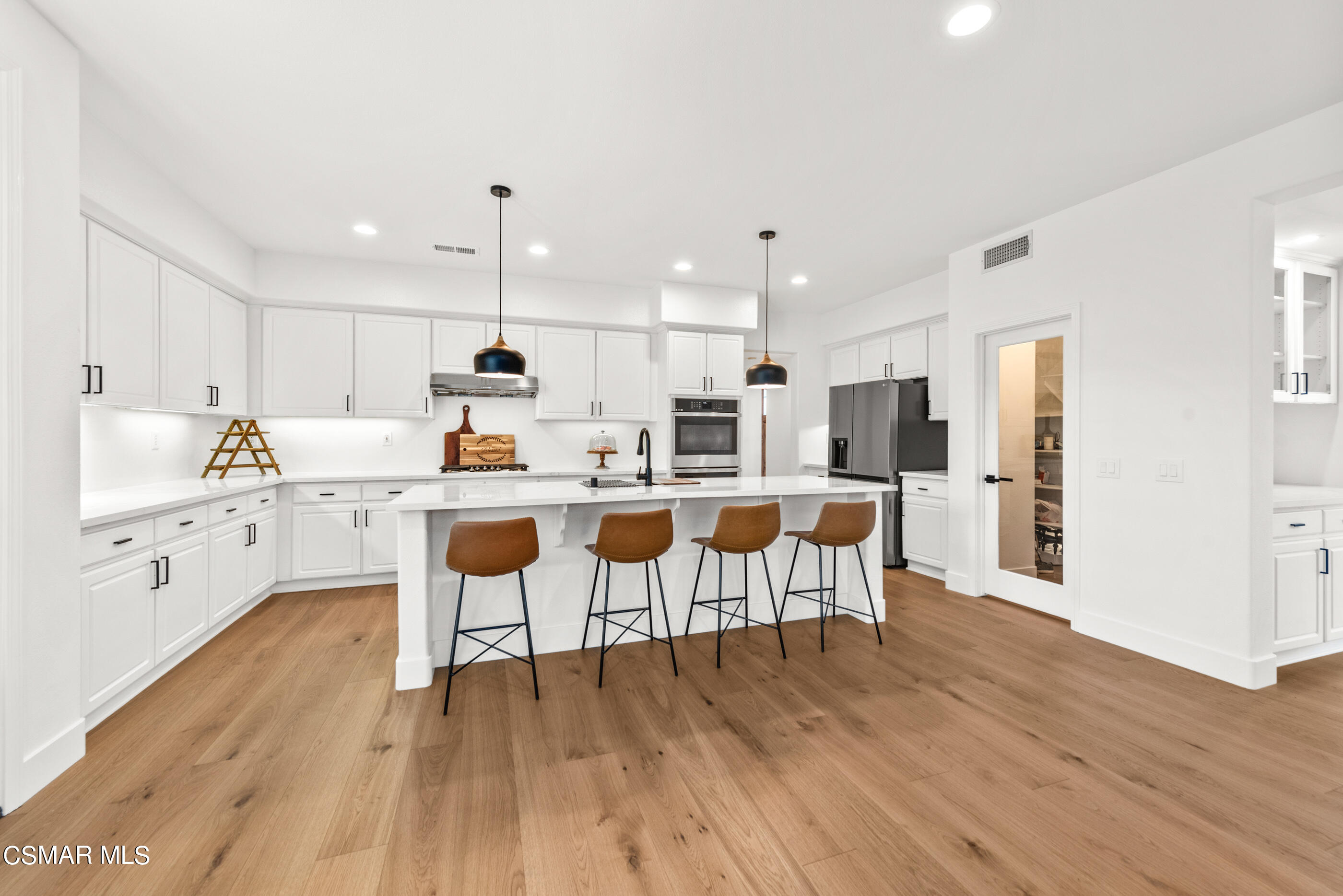5984 Piuma Court Simi Valley, CA 93063 - Photo 20 of 70 Abundant cabinets & walk-in pantry