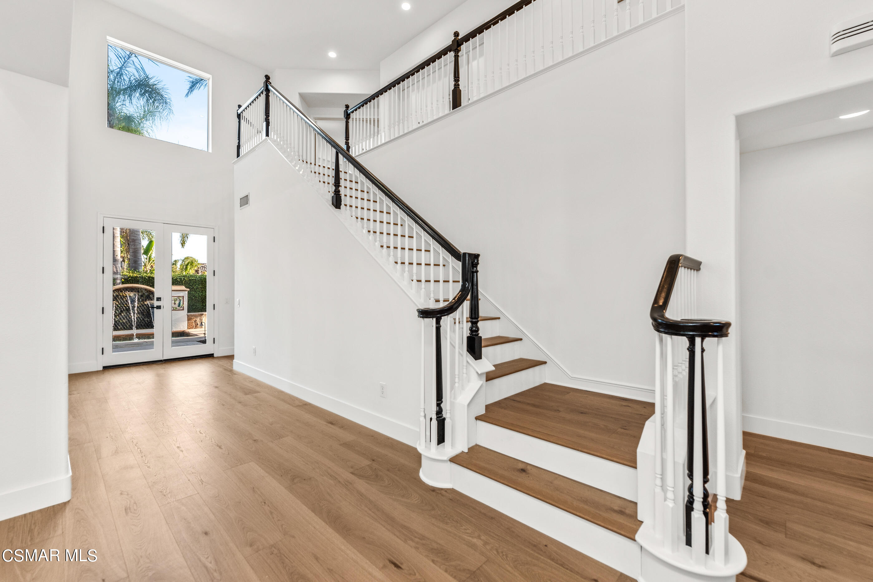 5984 Piuma Court Simi Valley, CA 93063 - Photo 34 of 70 a view of entryway with wooden floor and stairs