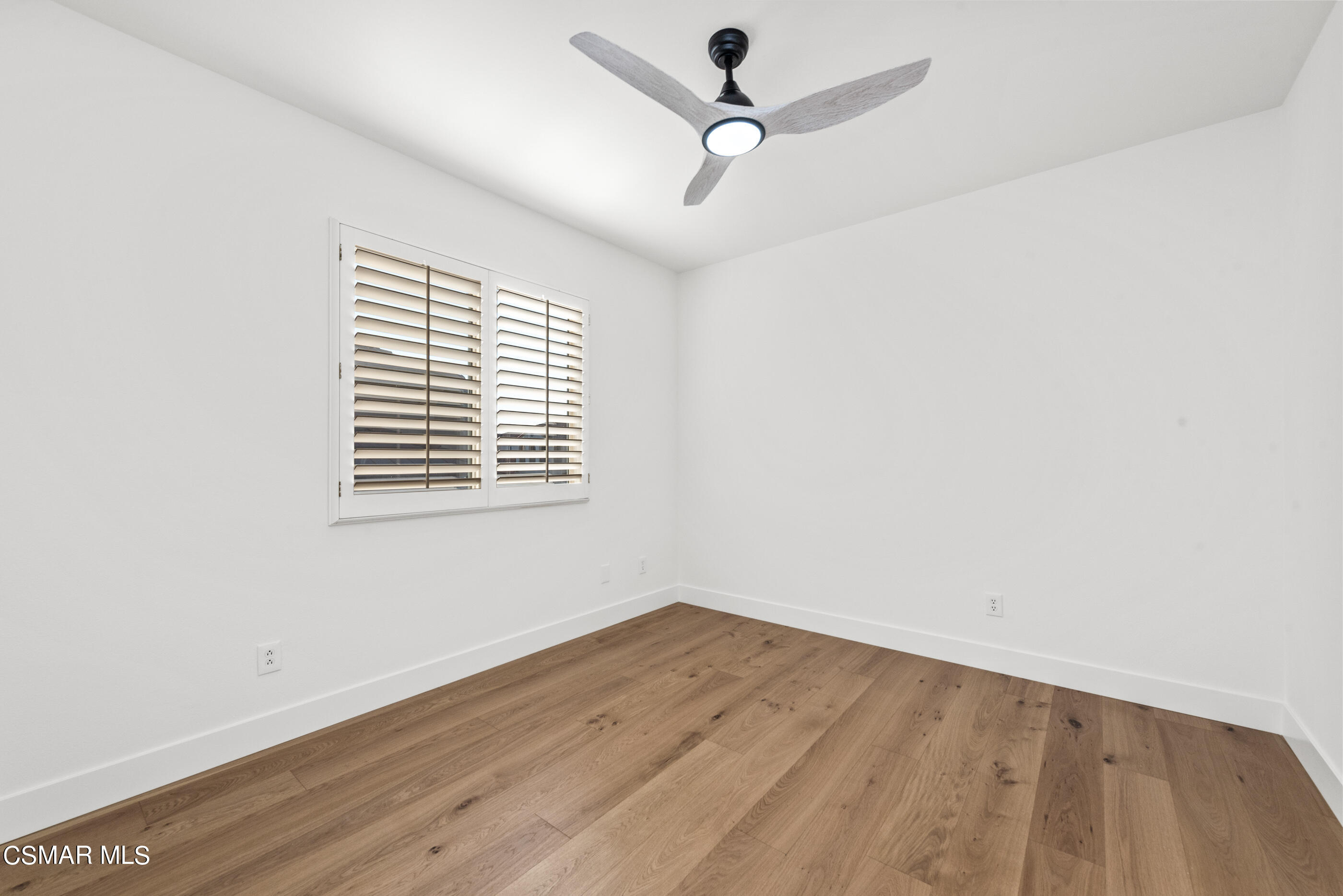 5984 Piuma Court Simi Valley, CA 93063 - Photo 49 of 70 a view of a room with wooden floor and windows
