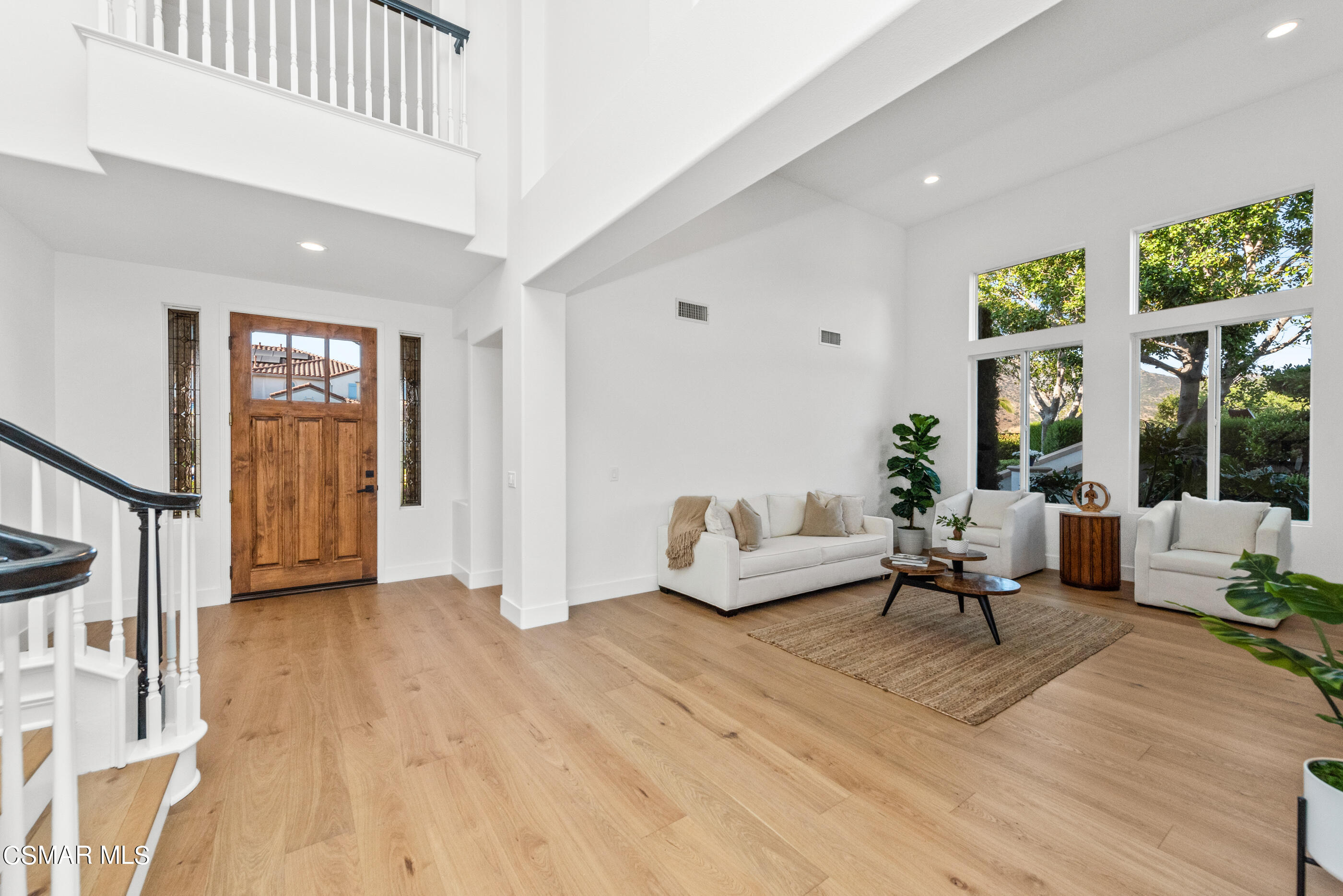 5984 Piuma Court Simi Valley, CA 93063 - Photo 10 of 70 a living room with furniture large window and wooden floor