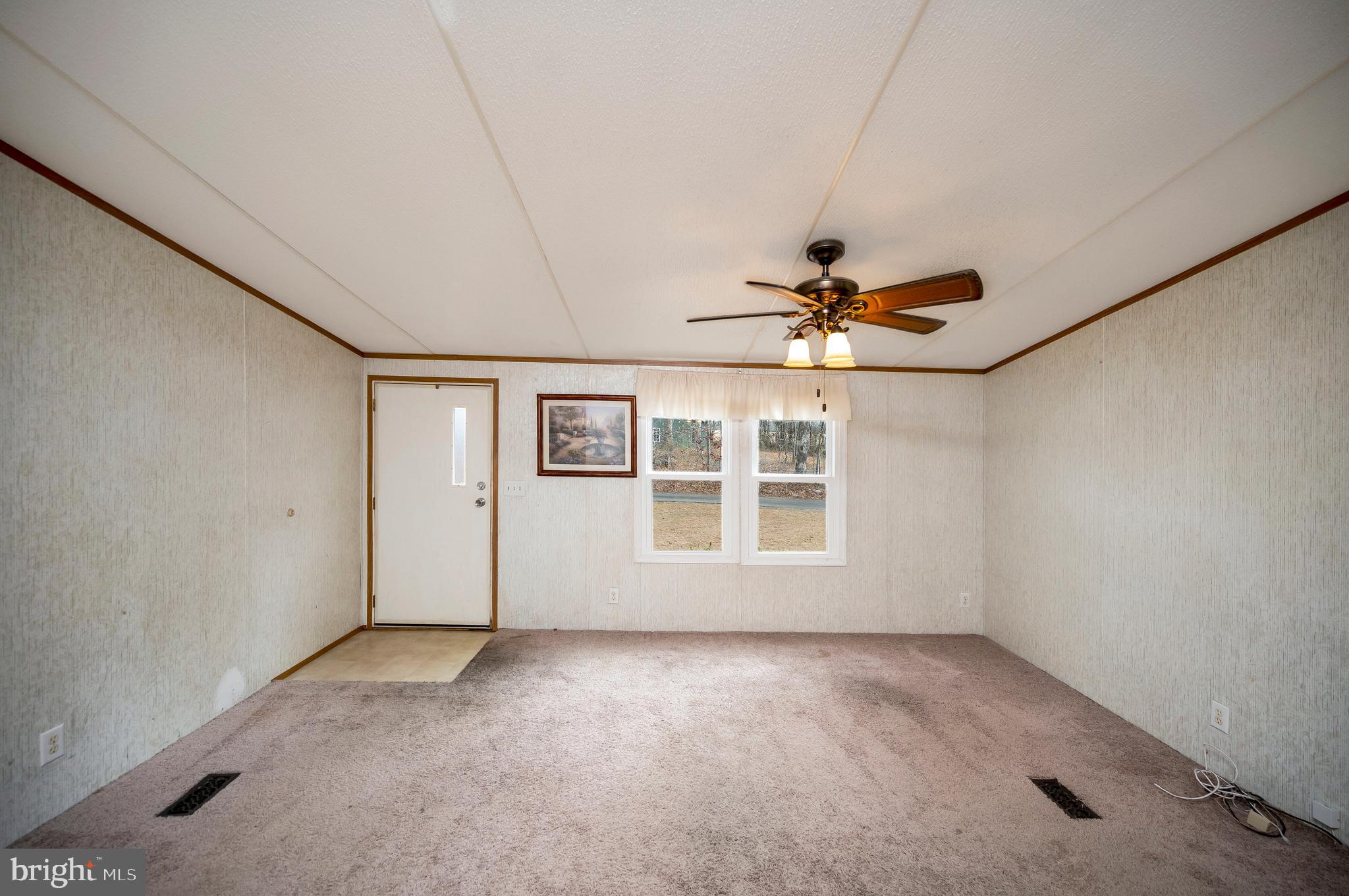 12619 Orange Plank Road Locust Grove, VA 22508 - Photo 29 of 43 a view of an empty room with a window
