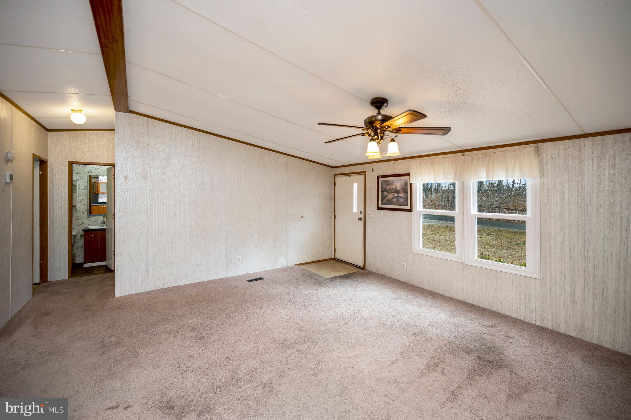 12619 Orange Plank Road Locust Grove, VA 22508 - Photo 30 of 43 a view of an empty room with a window