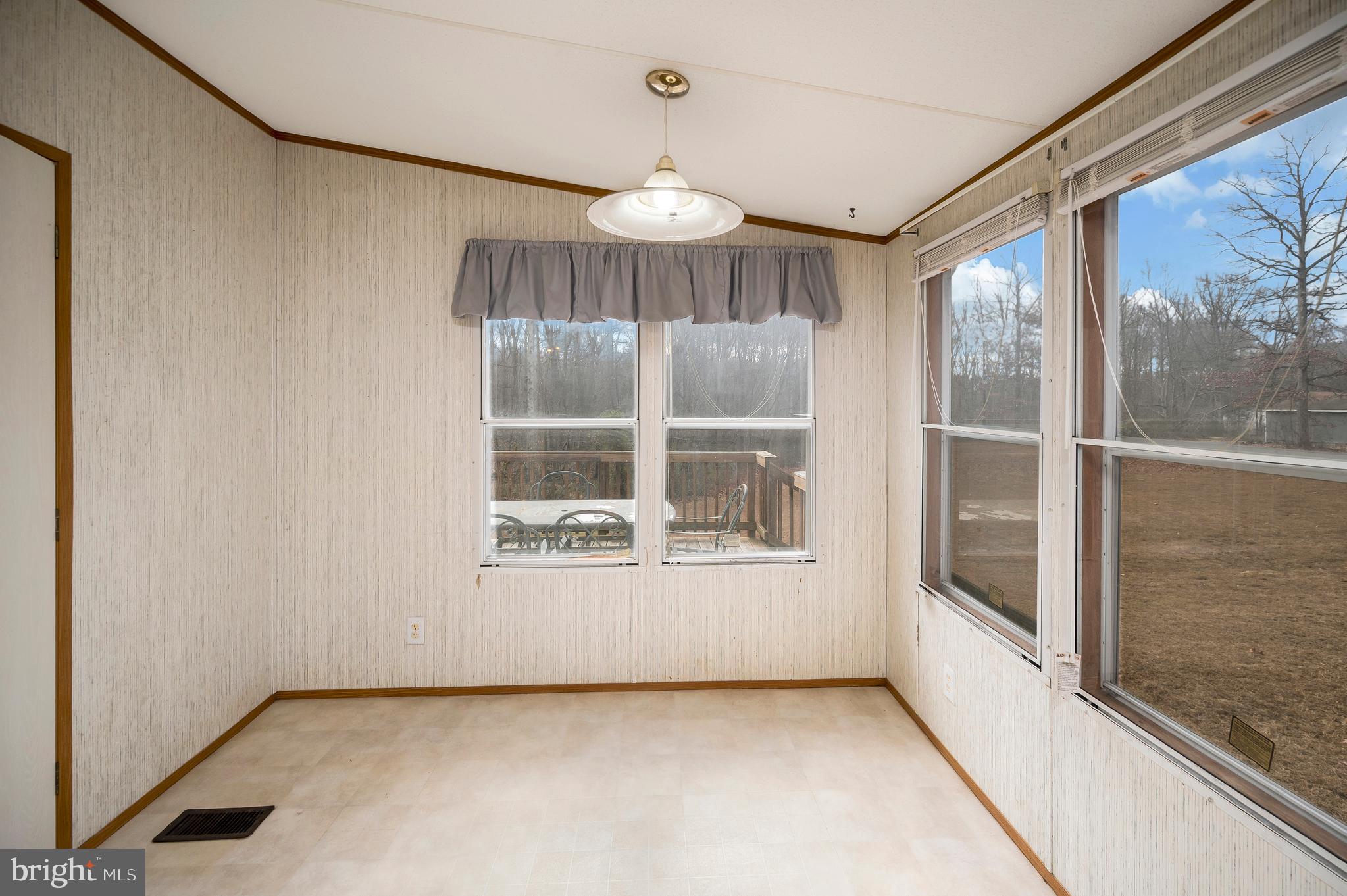 12619 Orange Plank Road Locust Grove, VA 22508 - Photo 32 of 43 a view of an empty room with a window