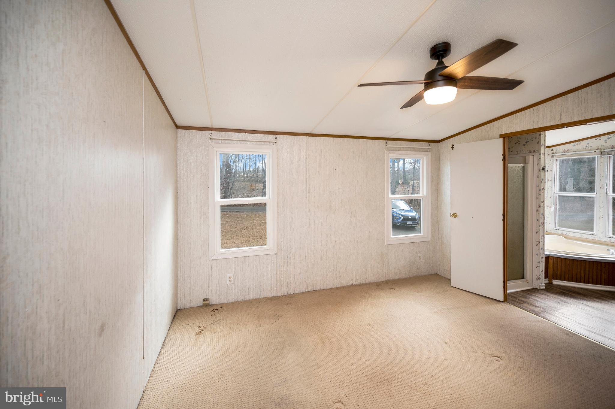 12619 Orange Plank Road Locust Grove, VA 22508 - Photo 33 of 43 a view of an empty room with a window