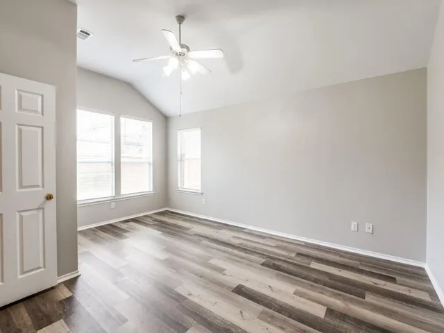 a view of entryway with window and chandelier