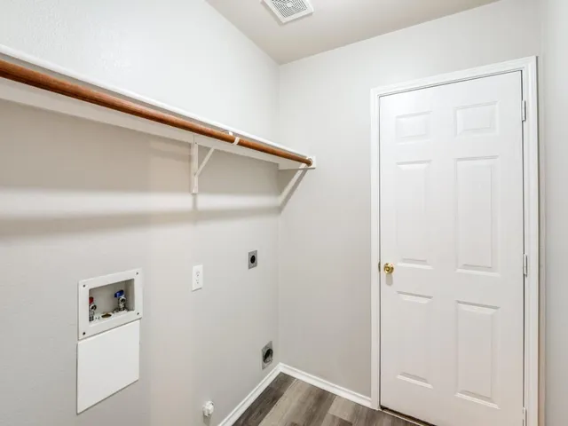 a bathroom with a sink toilet vanity and shower
