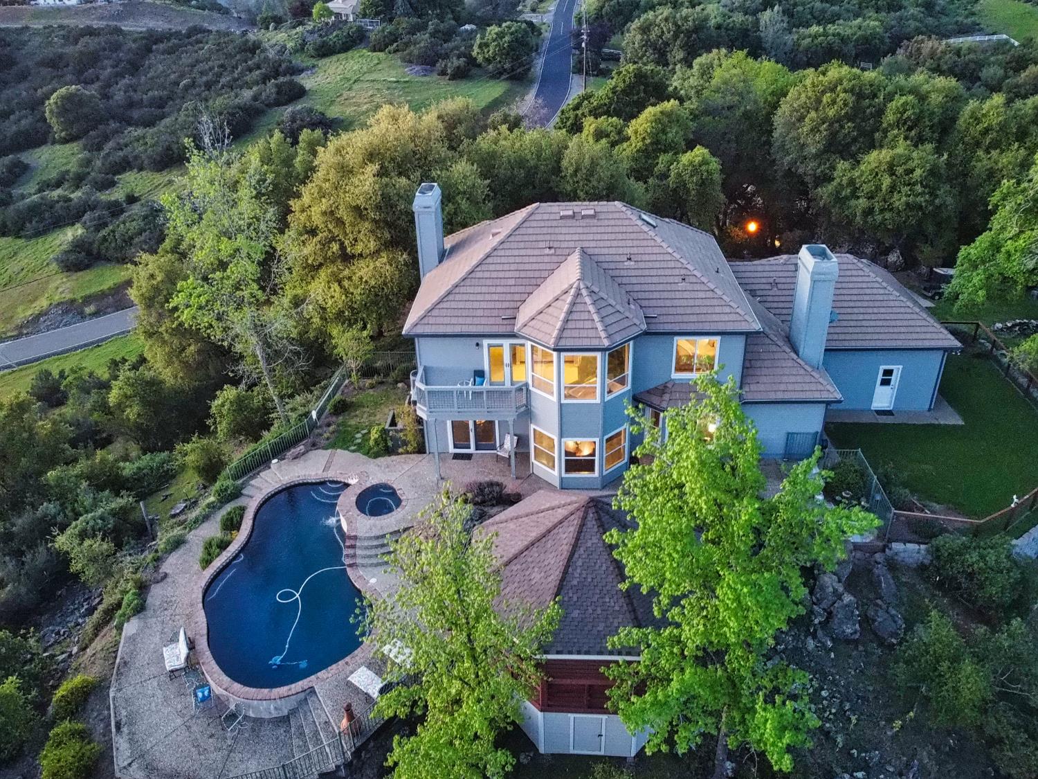 2405 Greensboro Road Placerville, CA 95667 - Photo 1 of 99 an aerial view of a house with garden space and a street view