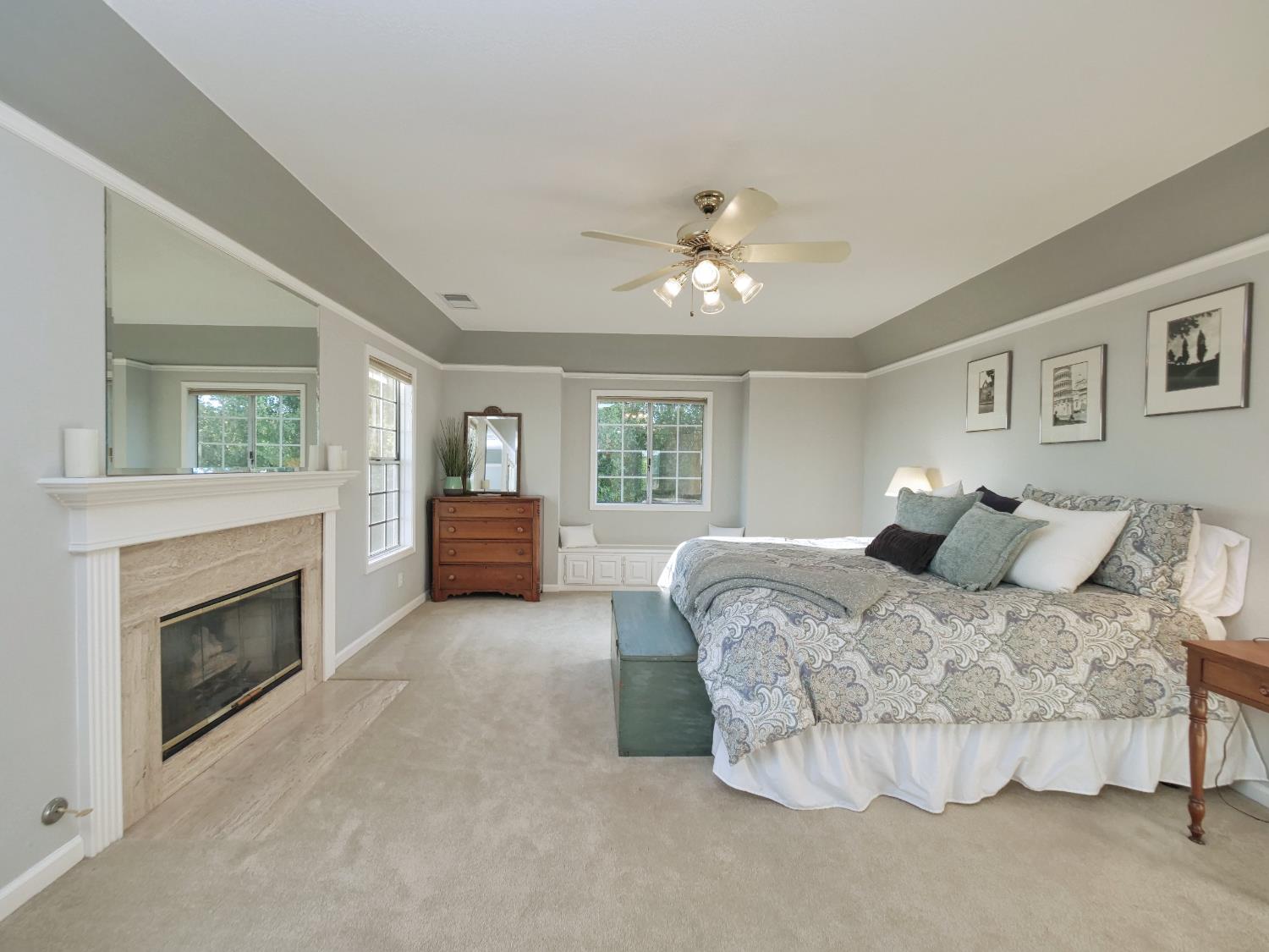 2405 Greensboro Road Placerville, CA 95667 - Photo 35 of 99 a bedroom with a bed and a fireplace