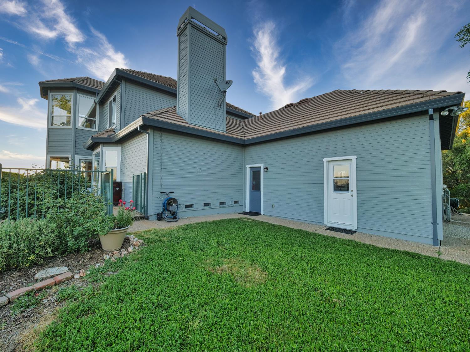 2405 Greensboro Road Placerville, CA 95667 - Photo 49 of 99 a front view of house with yard and trees in the background