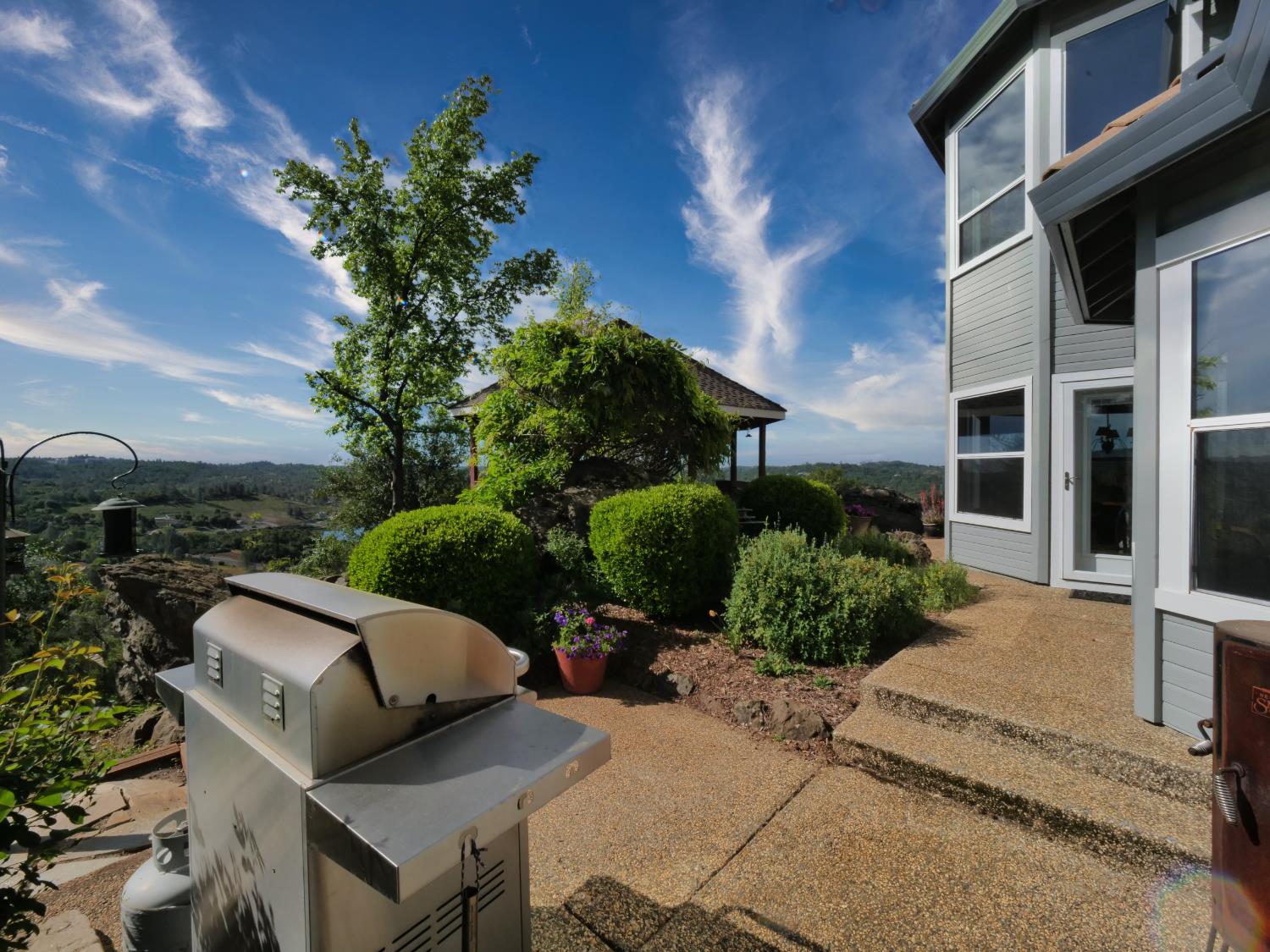 2405 Greensboro Road Placerville, CA 95667 - Photo 52 of 99 a view of backyard with outdoor seating and plants