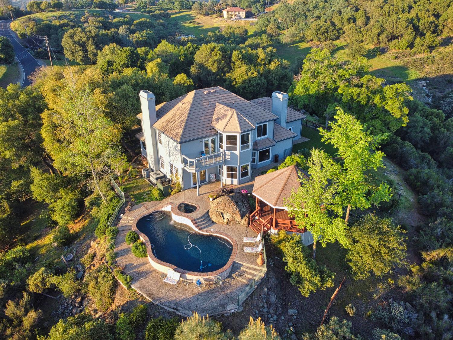 2405 Greensboro Road Placerville, CA 95667 - Photo 61 of 99 a aerial view of a house with yard swimming pool and outdoor seating