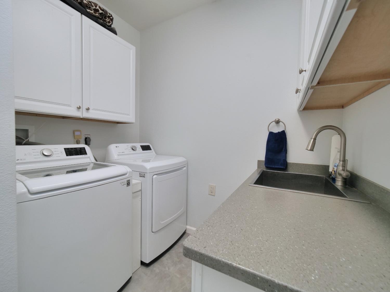 2405 Greensboro Road Placerville, CA 95667 - Photo 73 of 99 a view of storage and utility room with washer and dryer