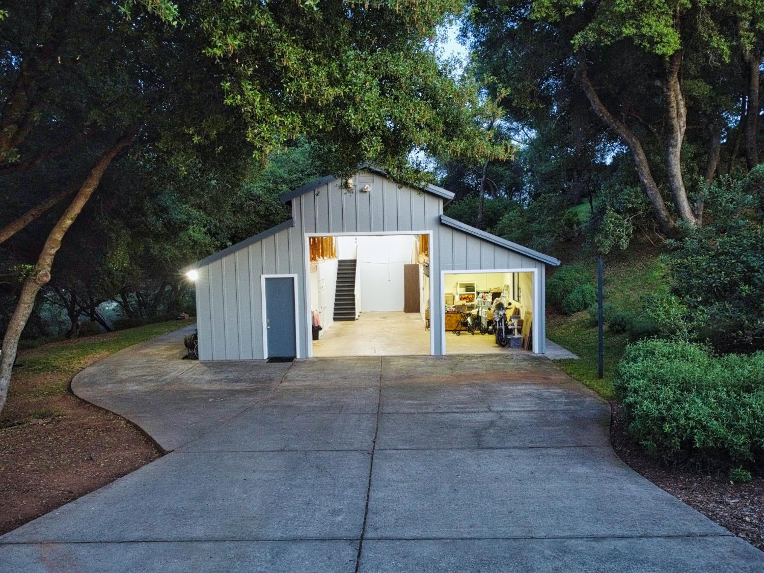 2405 Greensboro Road Placerville, CA 95667 - Photo 78 of 99 a view of a house with a yard and large tree