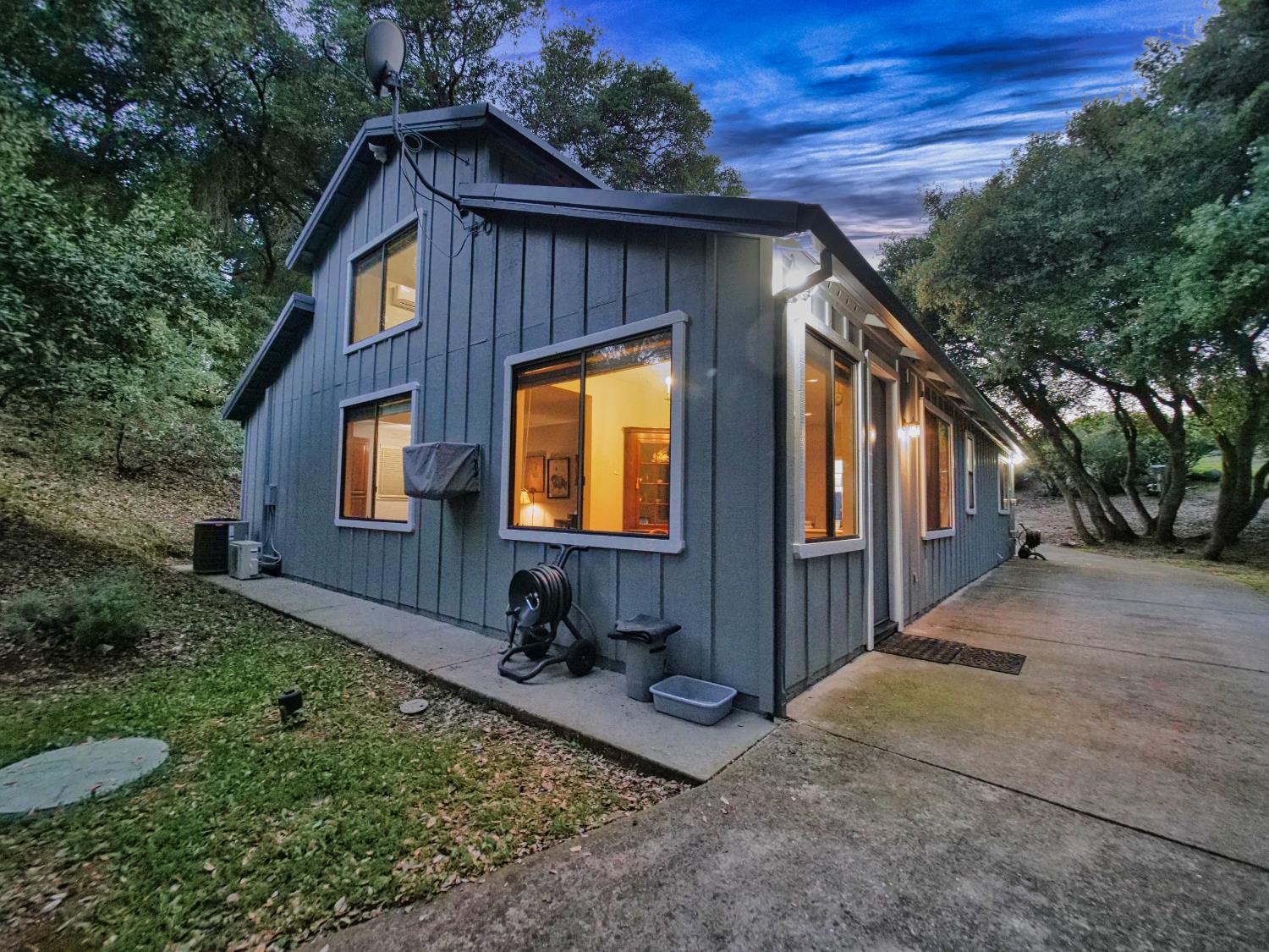 2405 Greensboro Road Placerville, CA 95667 - Photo 82 of 99 a front view of a house with garden