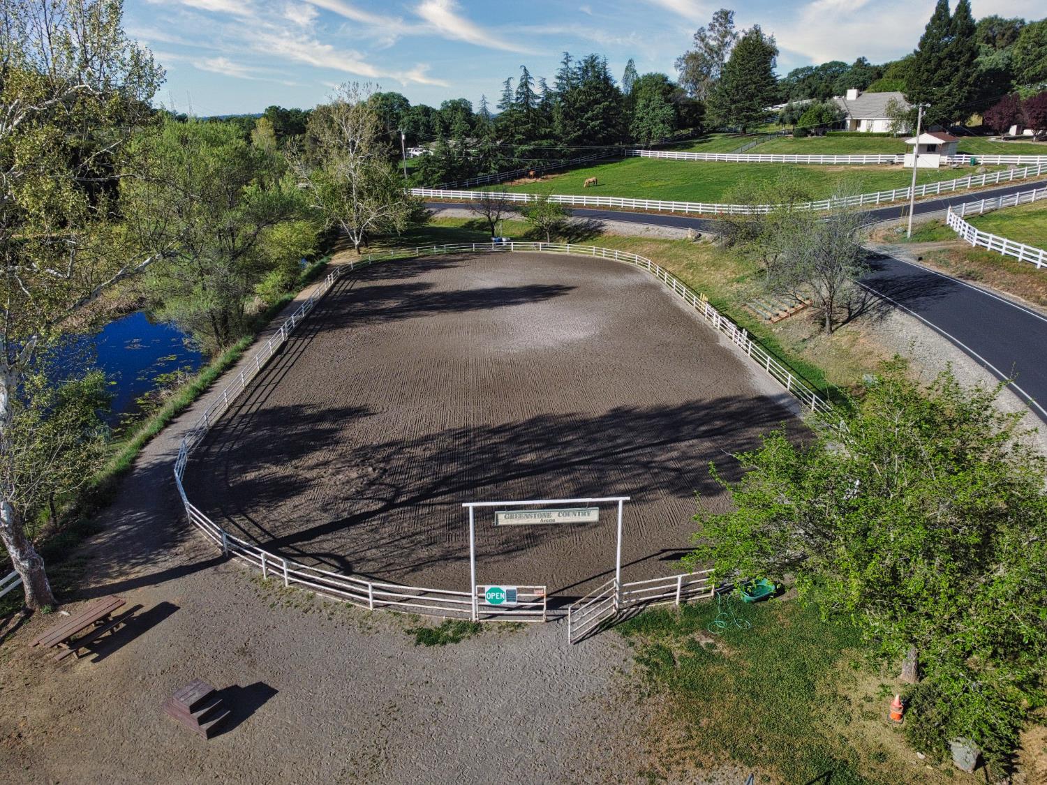 2405 Greensboro Road Placerville, CA 95667 - Photo 96 of 99 a view of a swimming pool with a yard and plants