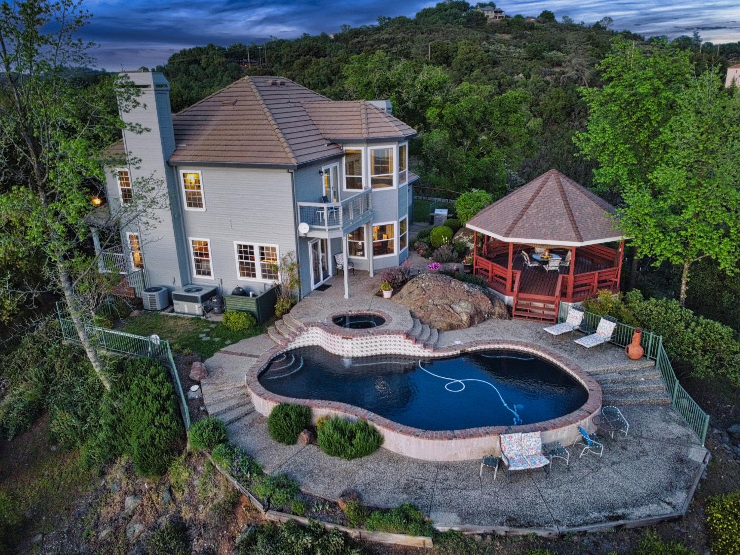 2405 Greensboro Road Placerville, CA 95667 - Photo 99 of 99 a view of a house with pool and trees