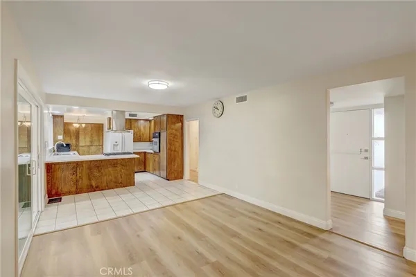 a view of livingroom with hardwood floor and a ceiling fan