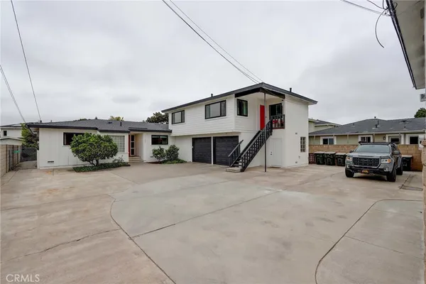 a view of garage and yard