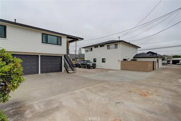 a kitchen that has a refrigerator stove and sink